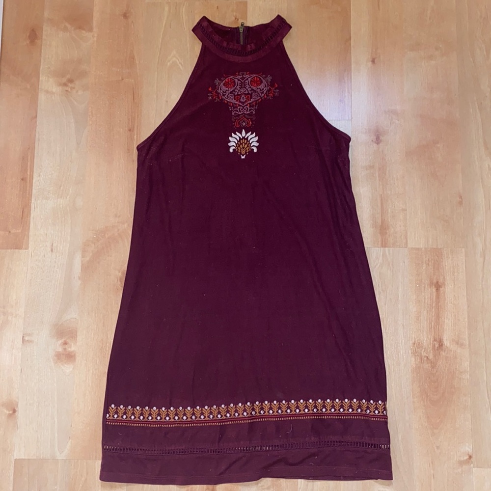 Maroon Boho dress with intricate stitching.